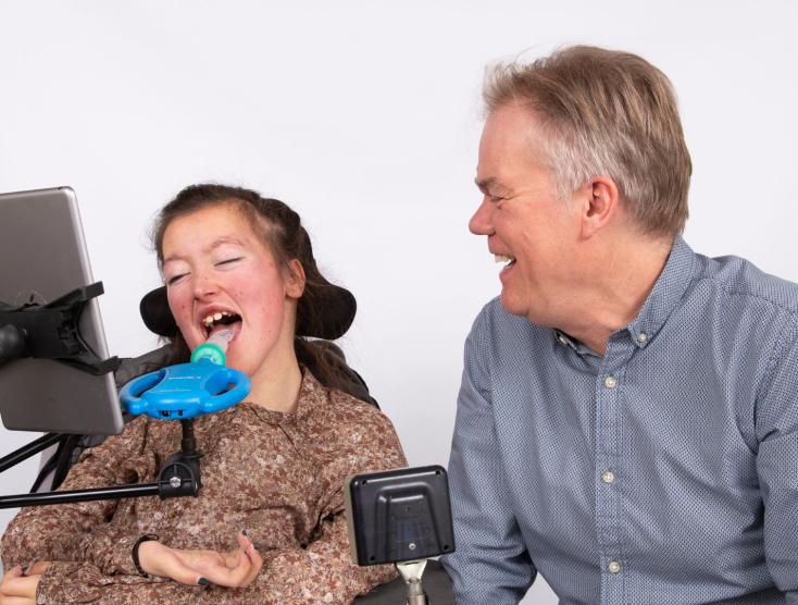 Ruud van der Wel samen met een kind met een handicap